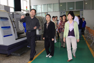 全国政协常委、民革中央副主席，民革中央妇女和青年工作委员会主任钮小明视察我院