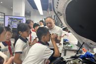 雒容小学学生到我校开展“汽车技术发展与职业体验”主题活动